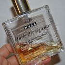 Swatch de Bouclette Ambition : Huile Prodigieuse - Huile Sèche multi-fonctions, Nuxe