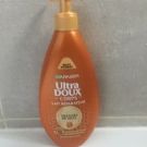 Swatch de Testeuse beaute party  : Lait Corps Réparateur Trésors de Miel Ultra Doux, Garnier