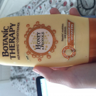 Swatch de amcmt : Après-shampooing Reconstituant Trésor de Miel, Garnier