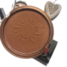 Swatch de Douceurapaillettes : Poudre compacte bronzante, Lovely Pop