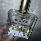 Swatch de Noreille : Huile Prodigieuse - Huile Sèche multi-fonctions, Nuxe