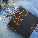 Swatch de Infinity2218 : Paradise found pourdre bronzante, Nars