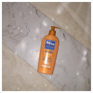 Swatch de Ericaaa : Lait Corps Nourrissant - Effet Soleil, Mixa