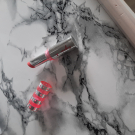 Swatch de clem2678 : B. Glossy ! stick Pêche Gold, Agnès b.