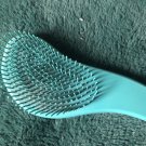 Swatch de Catarina : Brosse à cheveux bleu turquoise, Yves Rocher
