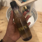 Swatch de Aïssa : Huile douche triphasée Ekos Maracujá, Natura Brasil