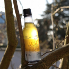 Swatch de peaudane : Huile douche triphasée Ekos Maracujá, Natura Brasil