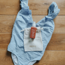 Swatch de Happylily : Huile protectrice solaire, MIDI12