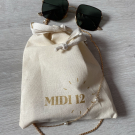 Swatch de Nyssa95 : Huile protectrice solaire SPF 50, MIDI12