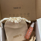 Swatch de Nyssa95 : Huile protectrice solaire SPF 50, MIDI12