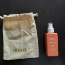 Swatch de chtidelf : Huile protectrice solaire, MIDI12