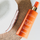 Swatch de Mathilda nisyawa : Bronz Impulse UV inCellium - Spray Visage et Corps, Institut Esthederm