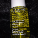 Swatch de flfl90 : Huile Anti-Eau, Clarins