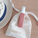 Swatch de Elod383 : Huile protectrice solaire SPF 50, MIDI12