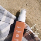 Swatch de peaudane : Huile protectrice solaire SPF 50, MIDI12