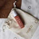 Swatch de Lorange : Huile protectrice solaire SPF 50, MIDI12