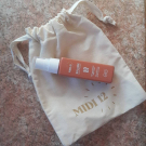 Swatch de Brenda100 : Huile protectrice solaire SPF 50, MIDI12