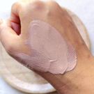 Swatch de Pinezoe : Crème solaire SPF50 Ma Protection Joli Teint, Omum
