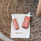 Swatch de Chloebsl : Duo huiles protectrices solaires SPF30 et SPF50, MIDI12