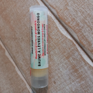 Swatch de Clémentine Lctr : Baume à lèvres Mongongo Jersey Shore Cosmetics parfum Mandarine verte et gingembre, Jergens