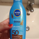 Swatch de Lilymi : Huile Sèche Protectrice Activatrice de Bronzage Protect & Bronze SPF 20, Nivea