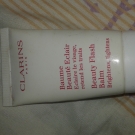 Swatch de satine04100 : Baume Beauté Eclair, Clarins