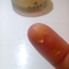 Swatch de Natty : Baume Lèvres Ultra Nourrissant Rêve de Miel, Nuxe