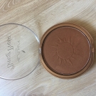 Swatch de Douceurapaillettes : Poudre compacte bronzante, Lovely Pop