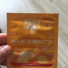 Swatch de Douceurapaillettes : Gelée Nettoyante Gommante Soin Bonne Mine Éclat d'Abricot, Le Petit Marseillais