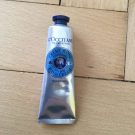 Swatch de Naty30G : Crème Mains Karité, L'Occitane