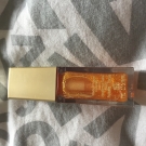 Swatch de little flower : Eclat Minute Huile Confort Lèvres, Clarins