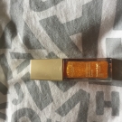 Swatch de little flower : Eclat Minute Huile Confort Lèvres, Clarins