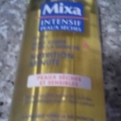 Swatch de chatte : Huile Corps sous la Douche Nutrition Minute, Mixa