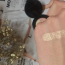 Swatch de fnlmr : Candlelight Glow - Enlumineur Visage, Too Faced