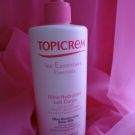 Swatch de Irys : ULTRA-HYDRATANT LAIT CORPS 500 ml, Topicrem